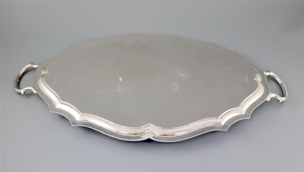 A George V silver shaped oval two handled tea tray, by Henry Stratford Ltd,